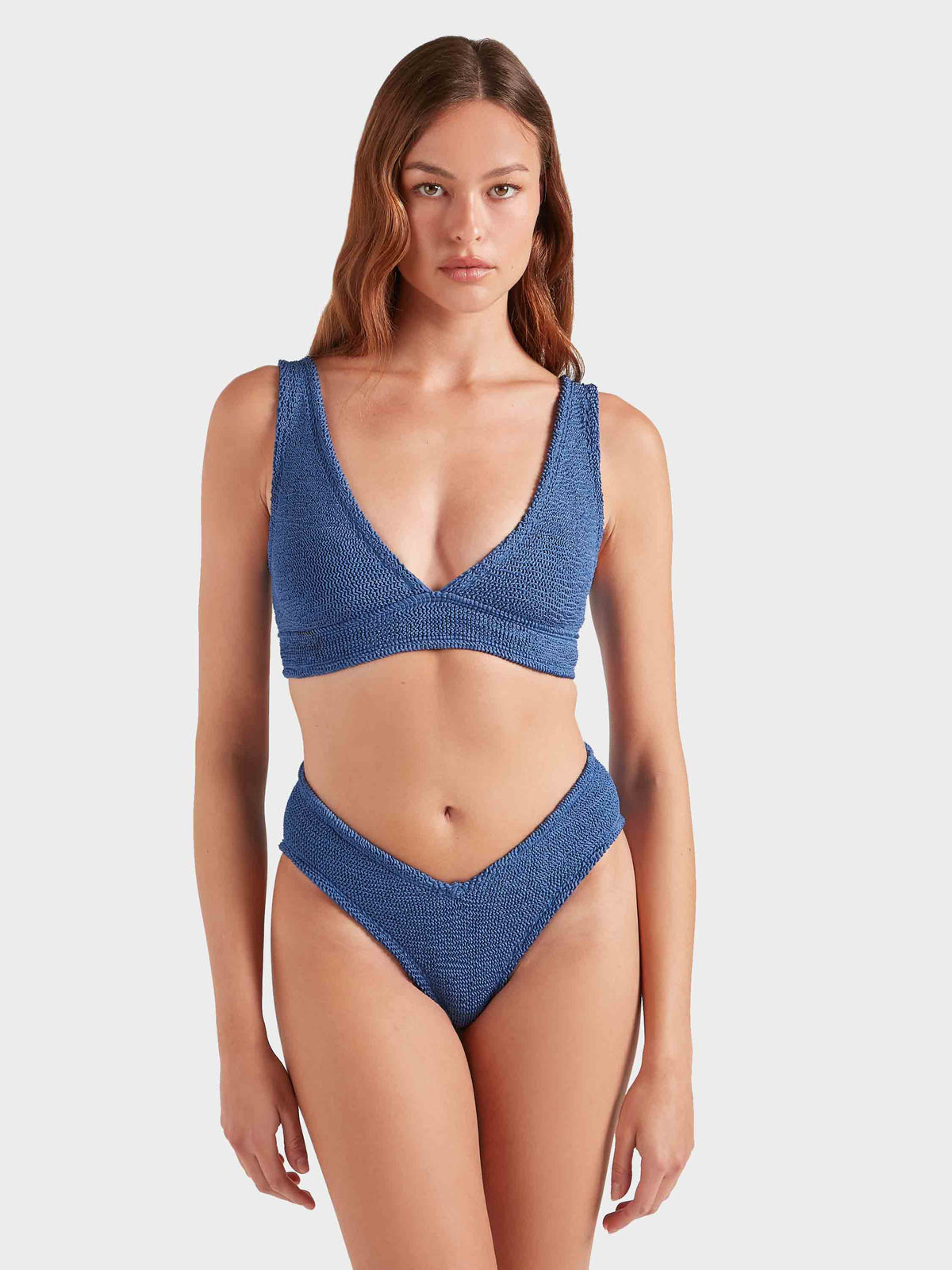 Model wearing metallic denim Angel bikini