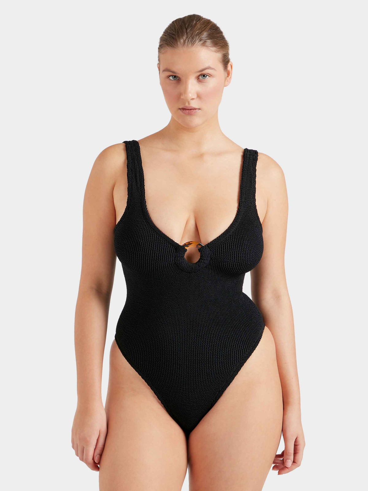Model wearing black Celine swimsuit