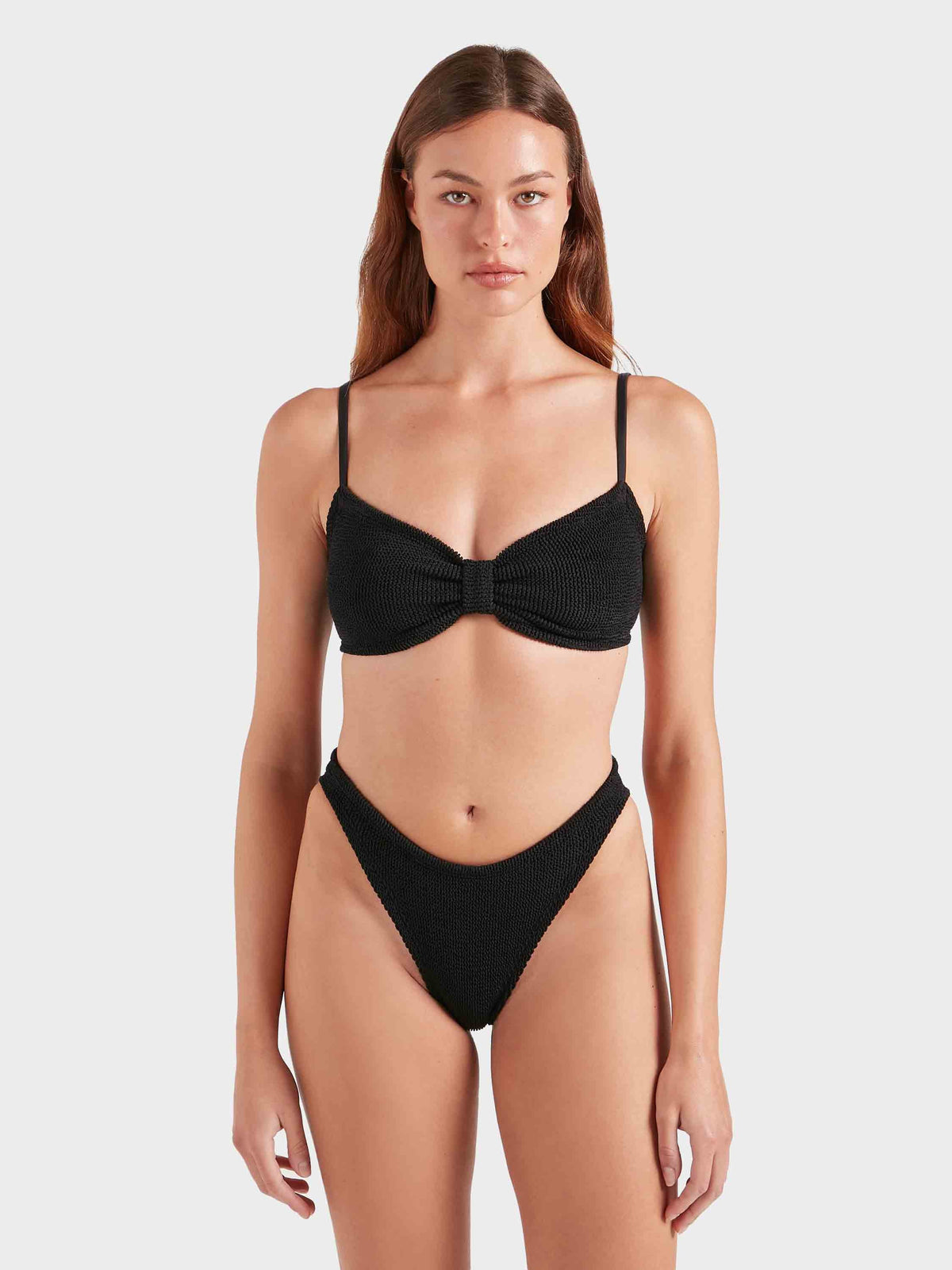 Model wearing black Alicia bikini 