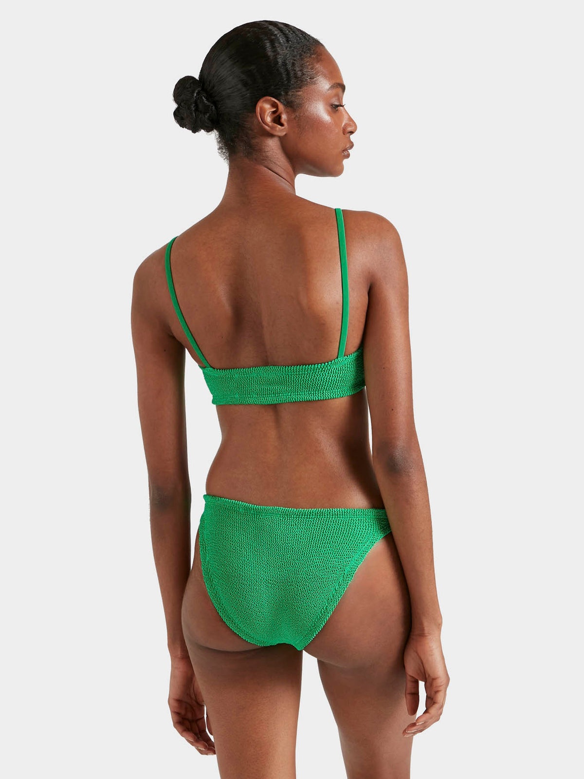 Back of model wearing emerald Alicia bikini 